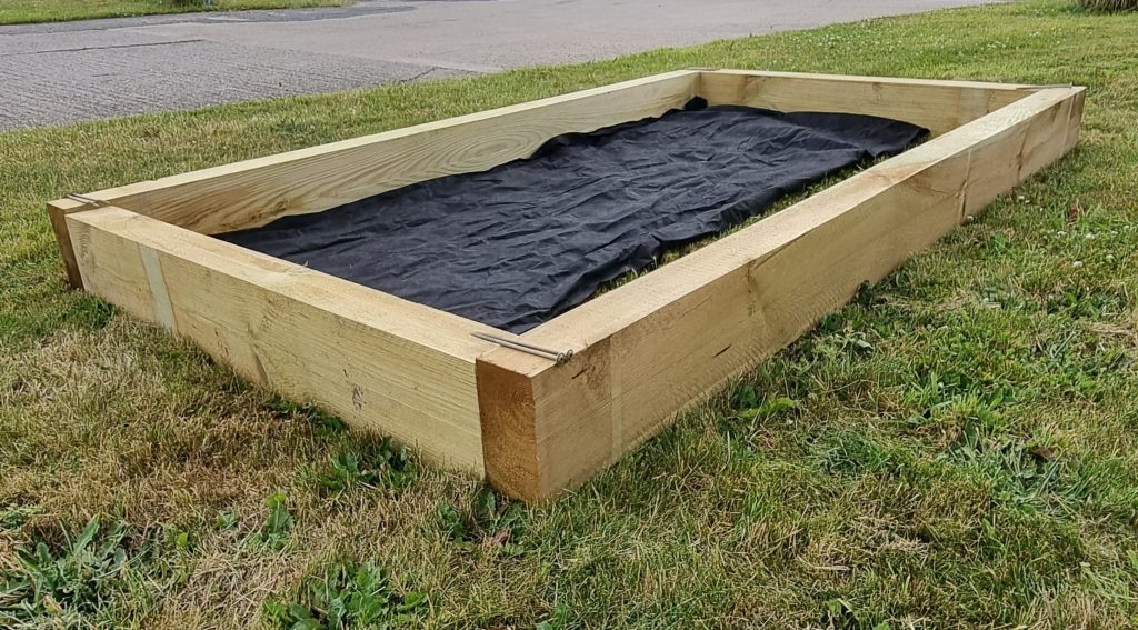 Learn to Build a Sandpit Using Timber Sleepers Park Timber
